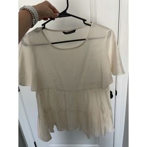 Tan tiered top